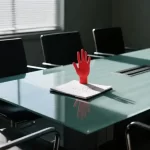 Why Your Hand Stays Down in Meetings and How to Change It